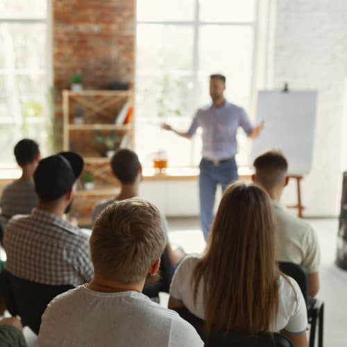 A pastor shares a teaching with a group of people.