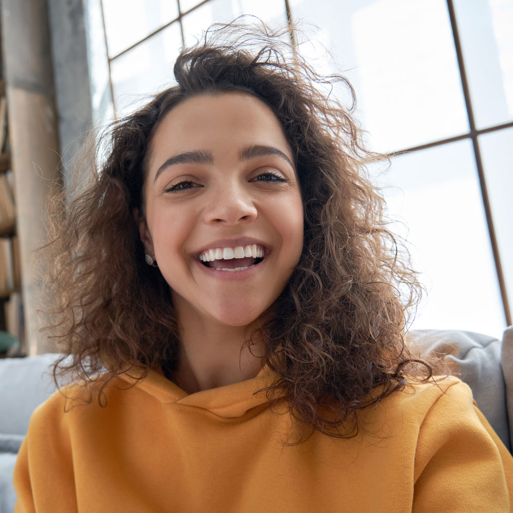 Teenage girl ready to participate in a small group.